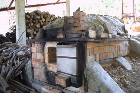 The Anagama kiln built by Jon with Japanese consultants is central to the studio's approach to pottery. This behemoth of an oven is wood-fired as it lends itself well to custom glazes using wood, sugar cane or cogon.
Photo by:: EPPGarcia (2002)