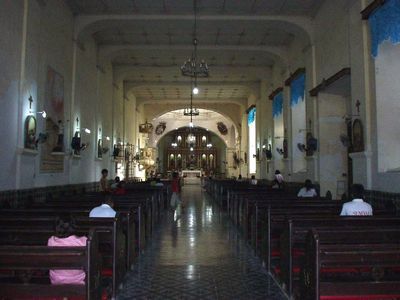 This photo taken on a Friday, shows a noteworthy number of people inside the church. It was because Friday is the day of pilgrimage and devotion to the Sto.Cristo de Burgos.
Photo by:: GBLontok (2003)