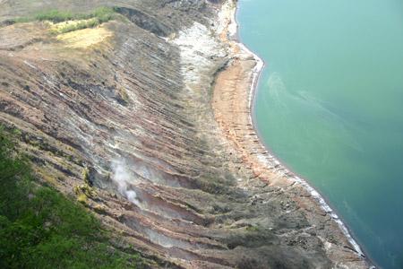 There still a bit of volcanic activity here. You can see steam venting from the ridge. The locals say there are times when these steam vents would spew out fountains of mud and ash.
Photo by:: EPPGarcia (2004)