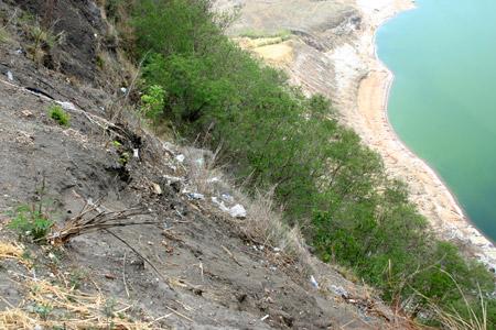 This is one photo which I don't feel like showing. But I feel I need to show it to drive a point. This is the litter and trash thrown by irresponsible trekkers and locals. This is what one sees together with the supposedly majestic view of the crater. This is the trash that we and dozens of foreigners saw when we went to this place. How sad ...
Photo by:: EPPGarcia (2004)