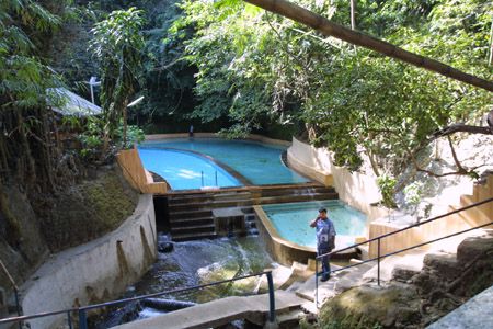 The pools in one of the resorts in Tambo Kulit. Mineral water fills the swimming pools and it spills over and joins the small river stream that passes underneath the pools.
Photo by:: EPPGarcia (2003)